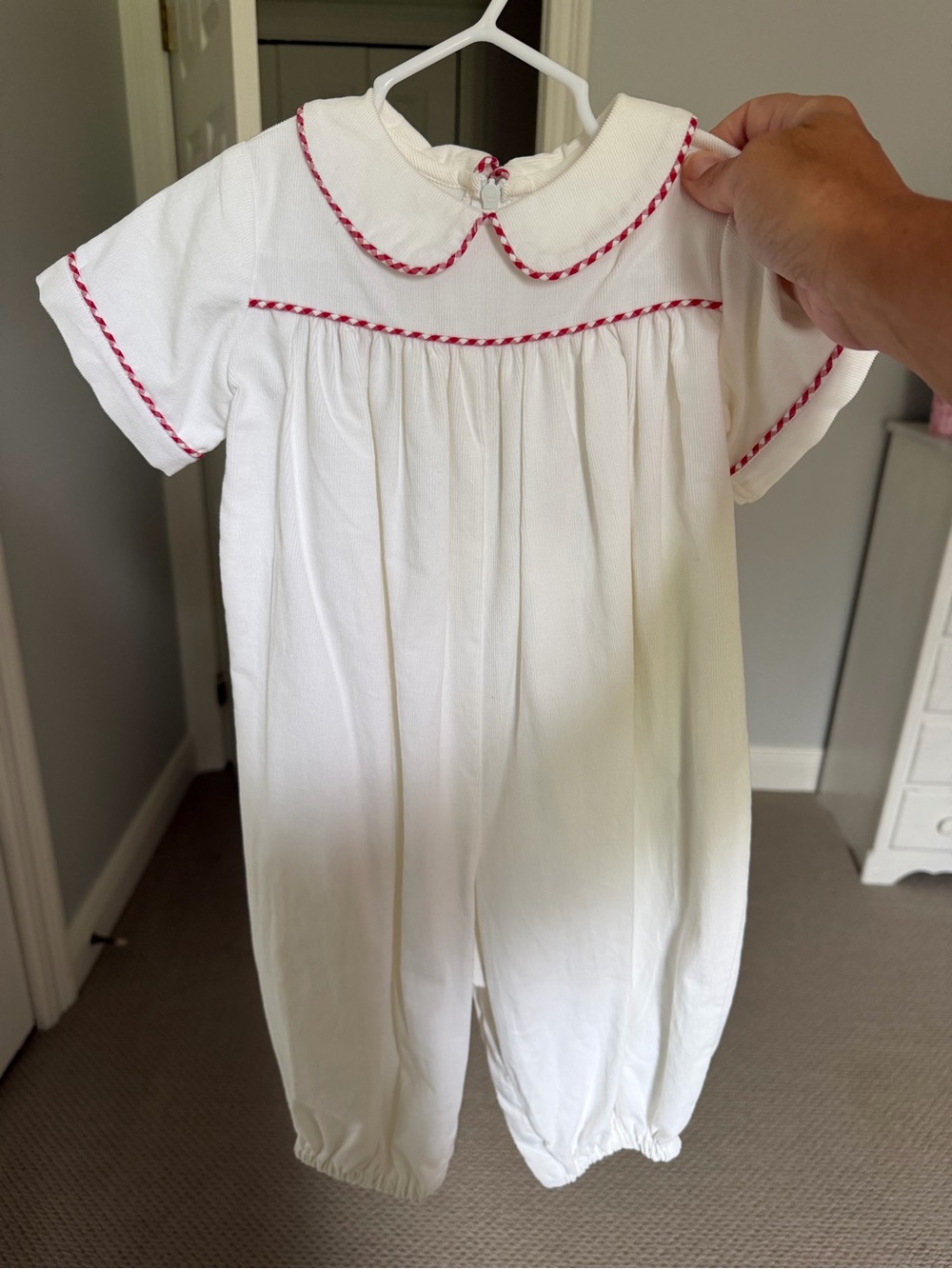 White toddler romper with Red Trim